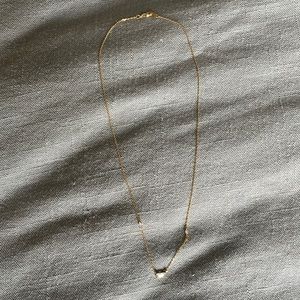 Cubic zirconia and gold tone necklace